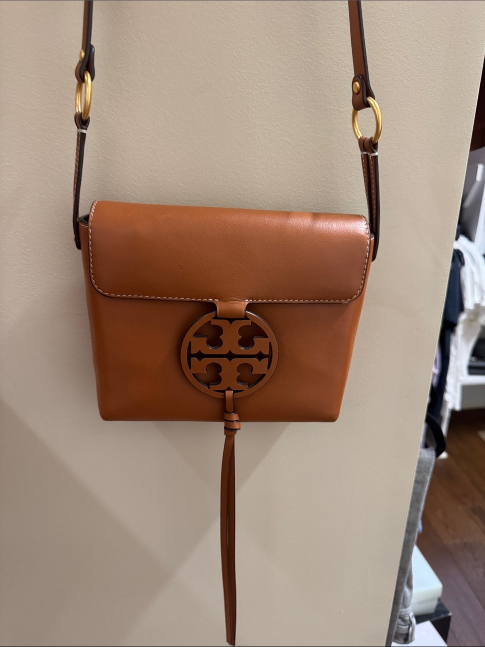 Tory Burch Cognac Leather Logo Tassel Crossbody in excellent condition and clean